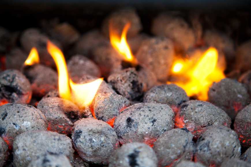 burning charcoal briquettes